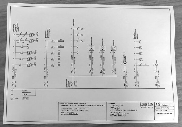 Photo d’un schéma unifilaire existant sur papier.